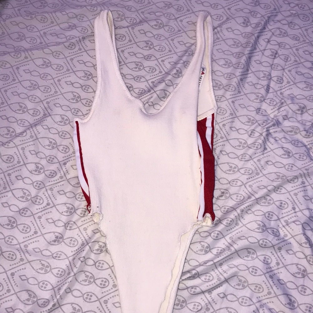 White and red skin tight bodysuit